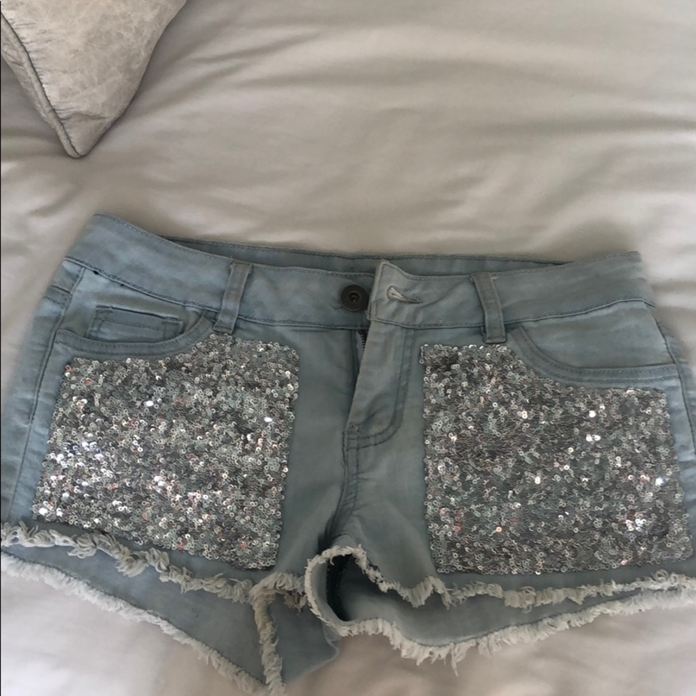 Sparkly light wash jean shorts